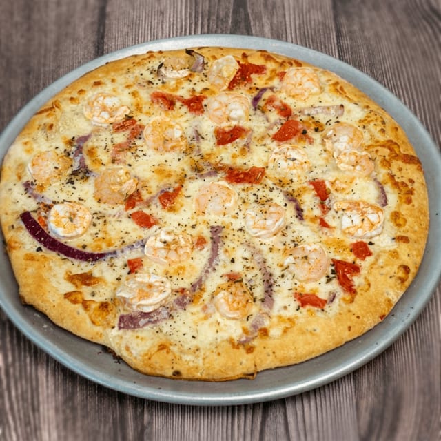 Shrimp Alfredo Pizza.